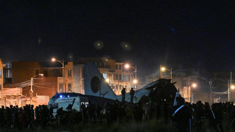 Bolivia’s military plane carrying banknotes crashes in capital city, at least 15 killed
