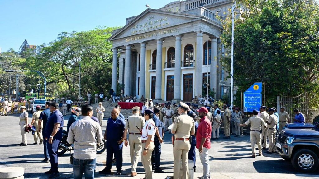 Workers converge around Town Hall in Bengaluru in response to strike call in protest against new labour codes