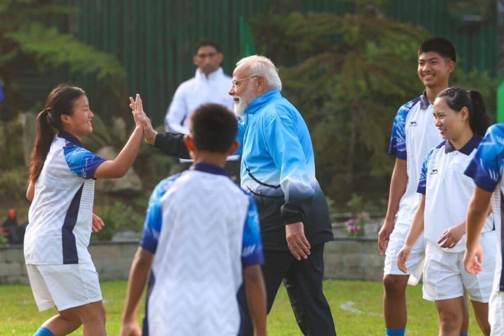 Narendra Modi plays football with children in Sikkim